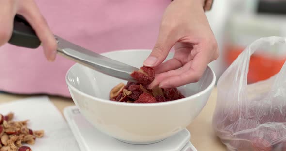 Cutting red jujube for making dessert at home