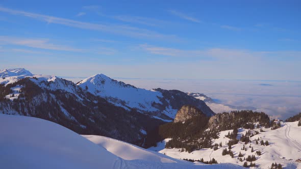 ski area in the Swiss alps with people and chairlifts in the winter ski area of ​​Beckenried