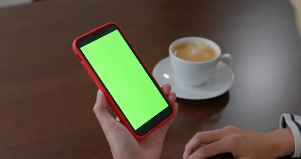 Woman Use of Mobile Phone with Green Screen 