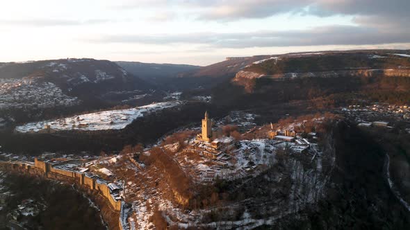 Aerial video above a hill with an old fortress