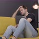 Depressed Unshaven Guy Suffering From Depression on Sofa - VideoHive Item for Sale