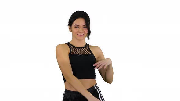 Sexy Dancing Young Sporty Woman on White Background