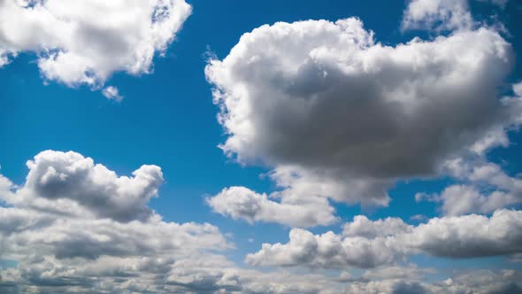 Clouds Move Smoothly in the Blue Sky. Timelapse. Cloud Space.