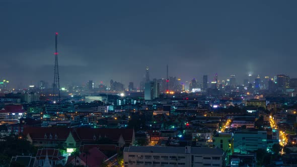 Scenery of Bangkok city on rainy and lightning stormy night. alt