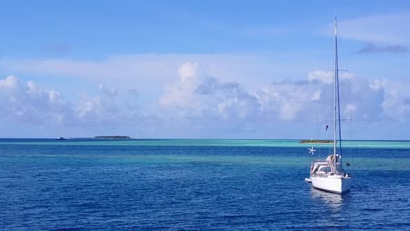 Drone aerial scenery of lagoon beach by blue sea with sand background