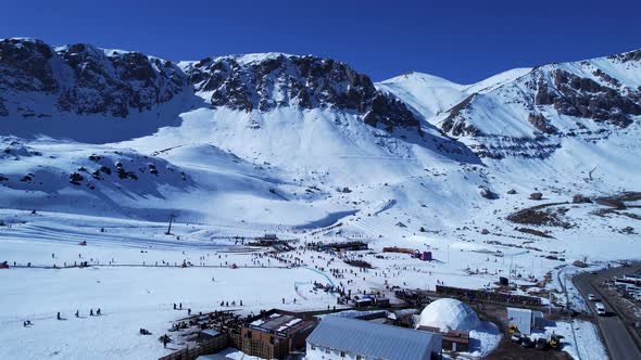 Panoramic view of Ski station centre resort at snowy Andes Mountains.