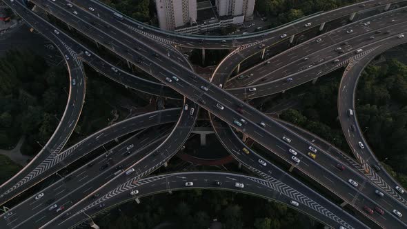 Aerial view of a busy road intersection in Shanghai at night, China. alt
