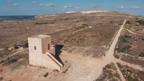 Aerial drone video from northern Malta near the Ghajn Znuber Tower.