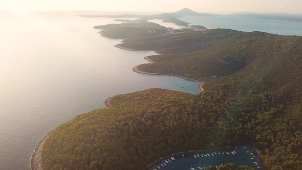 Aerial view of boats anchored at the shore of Krivica, Croatia.