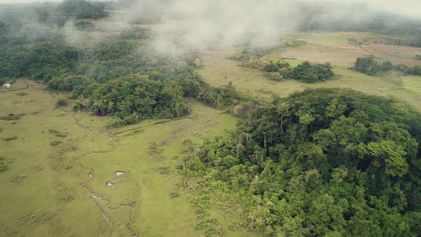 Philippines Foggy Haze Mountains Aerial View: Drone Flight Above Chocolate Hills. Mystery Landscape