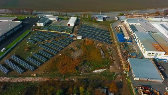 Solar panels with sunny sky above