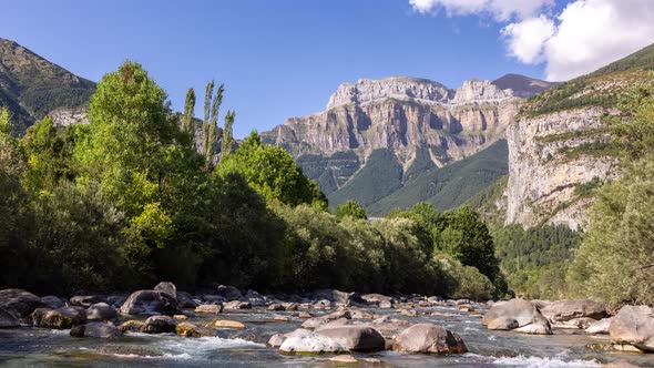 Clouds Passing Over Monte Pedido Mountains and River