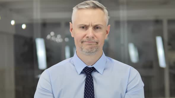 No Grey Hair Businessman Rejecting Offer By Shaking Head