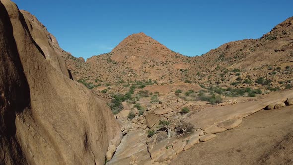 Stunning nature of Africa, aerial footage of a massive rocky mountain, Namibia