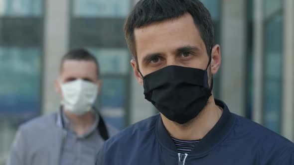 Men Is Protective Masks on the Street