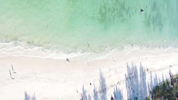 Vertical Video Boats in the Ocean Near the Coast of Zanzibar Tanzania Aerial View