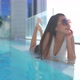Young asian woman enjoy around outdoor swimming pool for leisure - VideoHive Item for Sale