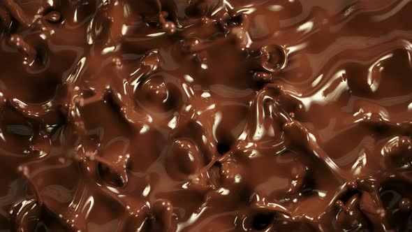 Super Slow Motion Detail Shot of Splashing Melted Chocolate at 1000 Fps