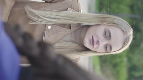 Vertical Video of a Young Skinny Girl in the Park