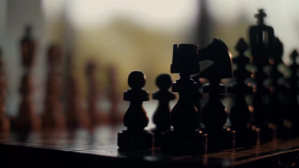 4K Cinematic Macro Pan Shot in Slow Motion with Wooden Chess Pieces