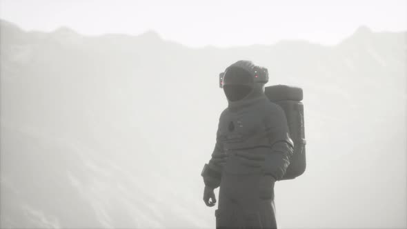 Astronaut on Another Planet with Dust and Fog alt