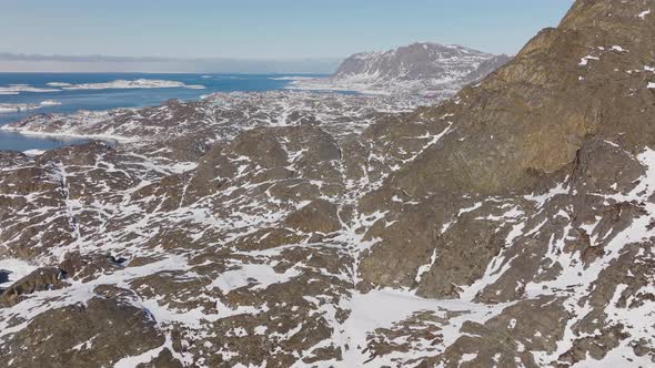 Drone Flight Over Rocky Mountain Near Sissiiut