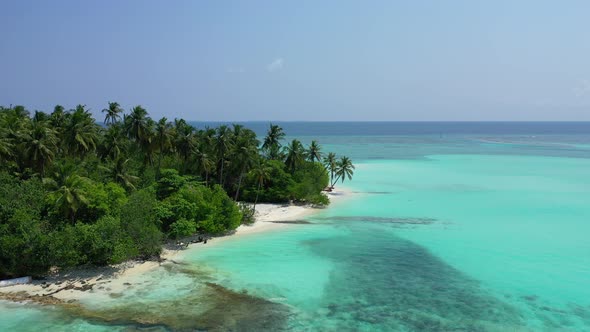 Wide aerial abstract view of a white paradise beach and aqua blue water background in colourful 4K