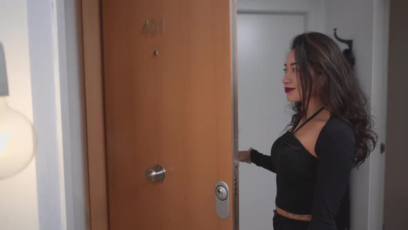 Colombian Woman Opens Door Welcomes And Hugs Her Friend