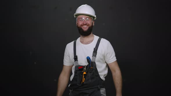 Smiling Repair Master with Protection Helmet and Glasses