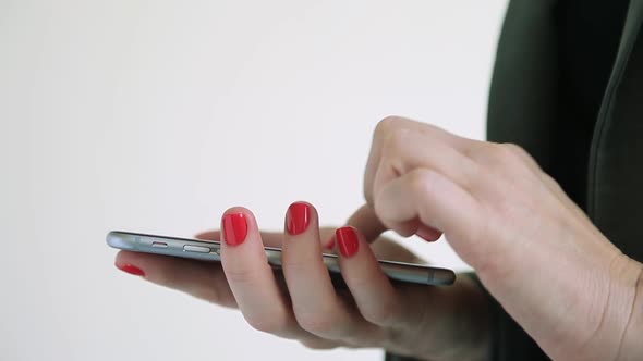 Closeup of Female Hands Texting on Smartphone Woman Typing Message or Email