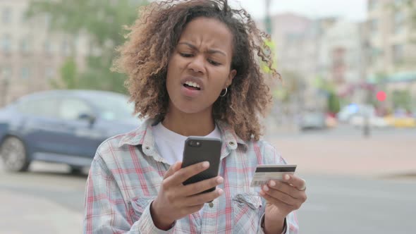 African Woman Frustrated By Online Shopping Failure Outdoor