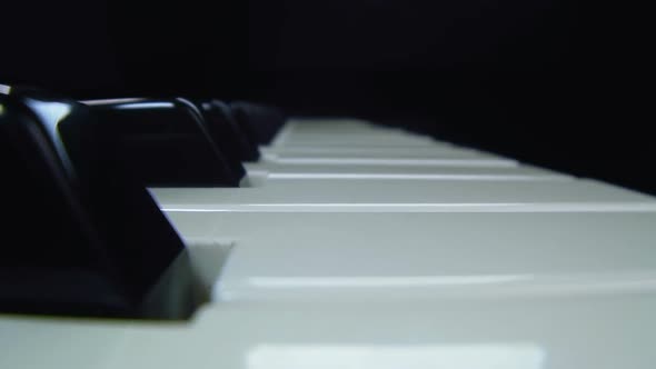 Piano Keyboard on Background Abstract. Dolly Shot
