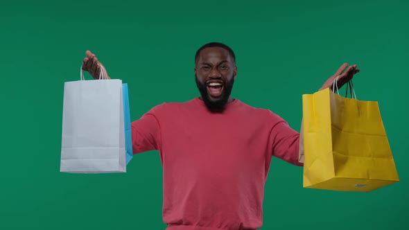 African American Man with Colorful Shopping Bags