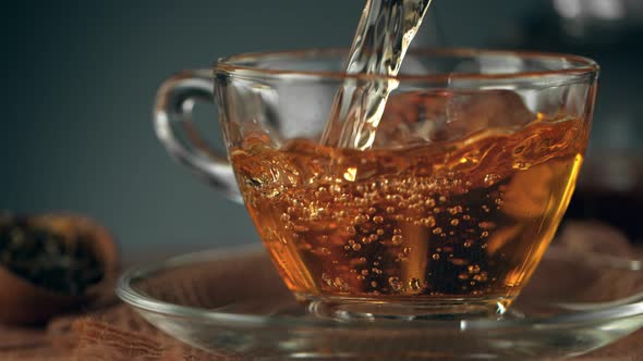 Super Slow Motion Shot of Pouring Tea at 1000 Fps with Still Life Background