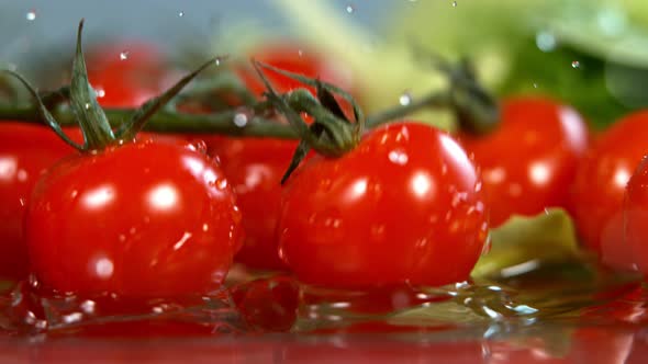 Tomatoes Falling To Water in Super Slow Motion, Shot with High Speed Cinema Camera 