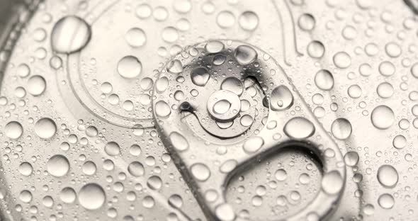 Water droplets on can of soda or beer