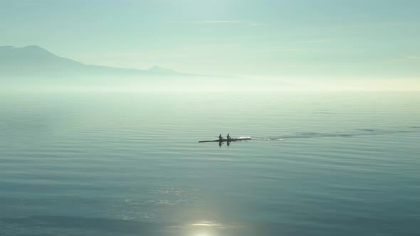 Two Men Kayaking on Sunny Day on Lake Geneva. Swiss Alps, Switzerland