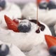Chocolate is Poured on Meringue with Powdered Sugar Blueberries and Strawberries - VideoHive Item for Sale