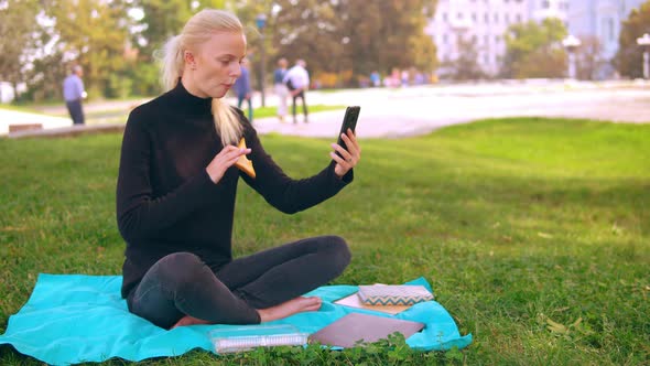 Blonde Student Has Video Call with Friend