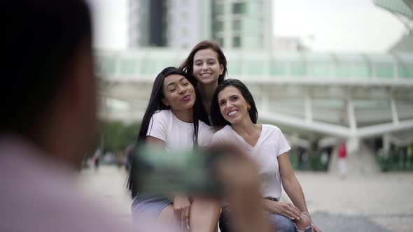 Smiling Young Women Posing for Photograph