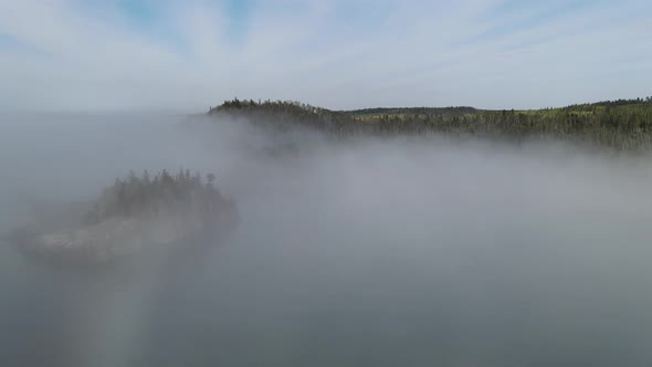 Fog at north shore minnesota, lake superior landscape aerial footage
