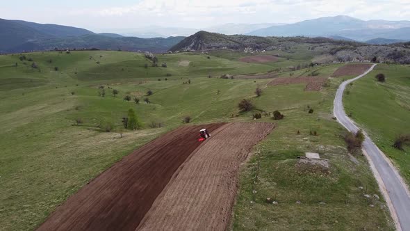 Aerial Shot Of A Tractor Working V3