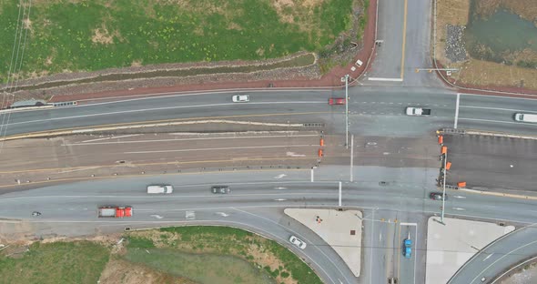 Aerial View of Cars Driving on Highway Intersection