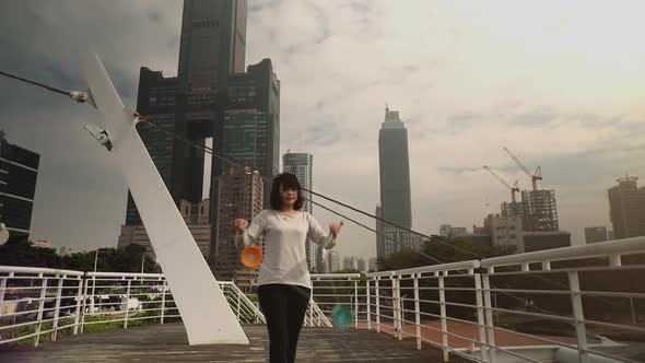 Taiwanese woman playing with a Chinese Yo-Yo