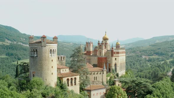 Aerial Drone Panoramic View of the Rocchetta Mattei Castle in Italy on Sunny Summer Day View From