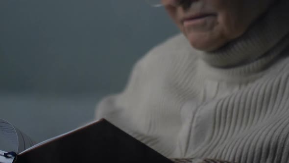 Depressed Pensive Elderly Lady Reading Diary Near Rainy Window, Old Memories