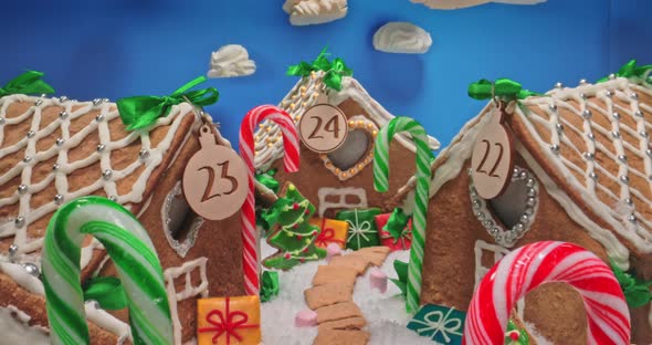 Gingerbread cottage and meringue clouds. Gingerbread village for Christmas.