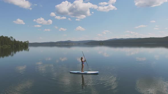 Paddling Alone in Open Lake