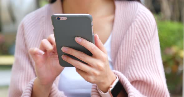 Woman Use of Smart Phone at Outdoor