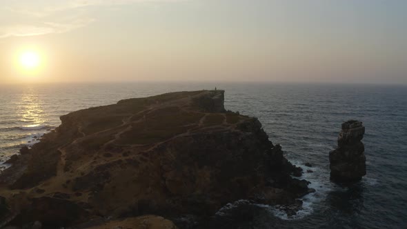 Aerial View of the Coastline and Cliffs During Sunset Near the City of Peniche. Portugal in the